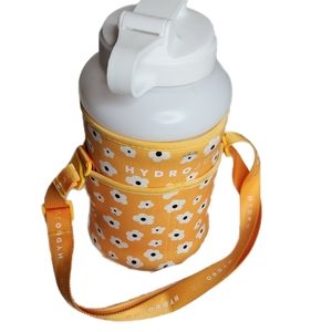 White hydro jug and yellow daisy sleeve